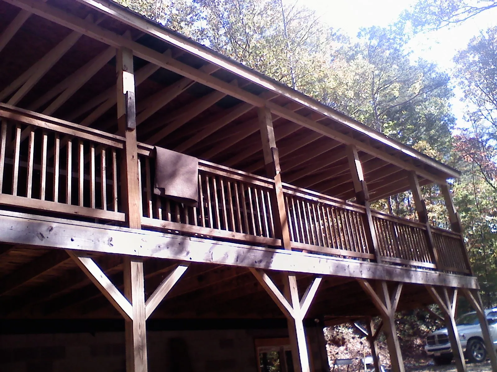 Timber framing under a new elevated porch and deck — Roof Leak Repair in Stryker by Roofing Brothers
